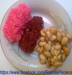 three different types of food on a white plate with pink and red frosting in the middle