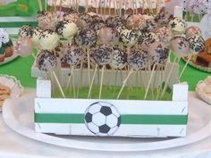 cake pops with sprinkles and a soccer ball on them