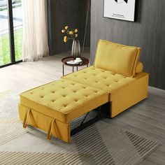 a yellow chaise lounge in a living room