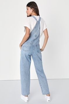 The Levi's Vintage Medium Wash Overalls are a tried and true staple that we know you're going to love! Sturdy denim (in Levi's What A Delight wash) shapes these classic overalls that have a front bib with a patch pocket and adjustable straps that form into a modified racerback. A seamed waist tops relaxed fit straight leg bottoms with two front pockets and two back pockets. Branded button closures at the hips. Red logo tag at back. Fit: This garment fits true to size. Length: Ankle length. Size Overalls Blue, 7 Months Pregnant, Cute Overalls, Vintage Overalls, Lulu Fashion, Long Torso, Logo Tag, Red Logo, Tried And True