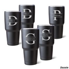 four personalized tumblers with the letter d in white on black, set of 4