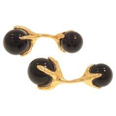 Elegant cufflinks handcrafted in 9k rose gold featuring eagle talons grabbing smooth onyx beads. The size of the bigger beads is 12 millimeters / 0.472 inches and of the smaller ones is 10 millimeters / 0.393 inches. These cufflinks are handcrafted in Italy by Botta Gioielli, marked with the Italian 9k gold mark 375 and Botta Gioielli brandmark 716MI. Handcrafted in: 9k rose gold. Natural smooth onyx beads size: 12 mm / 0.472 inches and 10 mm / 0.393 inches. Total weight: 14.7 grams. _______________________________________________________________________ Something about Botta Gioielli... Botta Gioielli is a two generation company. Both me and my father have worked as goldsmiths in the centre of Milan, the Italian design and fashion capital. My jewelry has always been characterized by the a Rose Gold Cufflinks, Gold Cufflinks, Onyx Bead, Natural Forms, Italian Design, Or Rose, My Jewellery, Onyx, Cufflinks