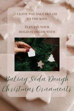 a white christmas ornament on top of a green tree with words saying leave the salt dough to the kids, elevate your holiday decor with