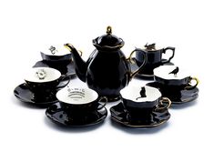 black and white porcelain tea set with gold trimmings