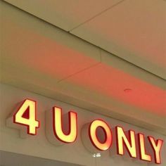 a neon sign that says 4 u only on it