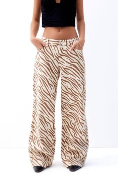 Make a bold statement with the Casey Zebra Print Low Rise Baggy Jeans from PacSun, perfect for standing out in any crowd. These jeans feature a low-rise fit, eye-catching zebra print throughout, a classic 5-pocket body, and wide leg openings with a baggy fit for ultimate comfort and style, all crafted from sustainably sourced cotton.Model is wearing a size 26Model measurements: 5’7” height, 30” bust, 23” waist, 33” hipLearn more about PacSun eco items PacSun Womens Casey Zebra Print Low Rise Baggy Jeans - Blue size 28 Low Rise Baggy Jeans, Pacsun Jeans, Printed Jeans, Baggy Jeans, Baggy Fits, Zebra Print, Accessories Jewelry, Pacsun, Womens Bottoms