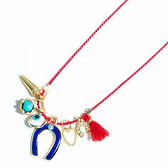 Our All The Luck Charm Necklace is perfect for layering or wearing alone. Handmade with 100% silk red string and 14k gold filled lobster clasp for extra security. Charms include our classic ceramic evil eye, gold spike, enameled horse shoe, turquoise droplet gem, and red tassel. This charm necklace is made to be 16" long but can be any length you choose, simply leave a note with instructions at checkout. The perfect gift for yourself or someone special awaits, and arrives perfectly packaged in o Ceramic Evil Eye, Luxe Necklace, Wearing All Black, Red String, Swarovski Stones, Luck Charm, Forever Jewelry, Horse Shoe, Luck Charms