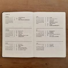 an open notebook with numbers on it