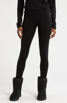 Stay warm on the coldest summits in these mid-rise, full-length leggings cut in a supercozy, merino-wool interlock knit. A wide waistband and chafe-free flatlock seams ensure a comfortable and flattering fit. 30" inseam; 8" leg opening; 10" front rise; 12" back rise (size Medium) Elastic waistband 100% merino wool Machine wash, tumble dry Imported Snow Fashion, Base Layer, Wide Waistband, Stay Warm, Merino Wool, Full Length, Nordstrom, Leggings, Black