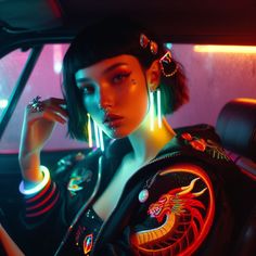 a woman sitting in the back seat of a car with neon lights on her face