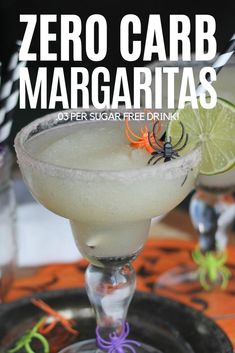 a drink in a glass with a spider on the rim next to it and text that reads, zero carb margaritas super sugar free drink