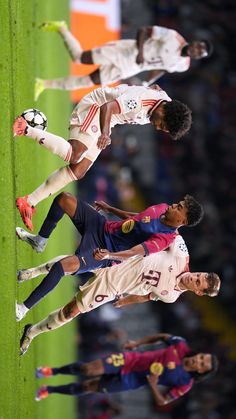 three soccer players are standing on the field