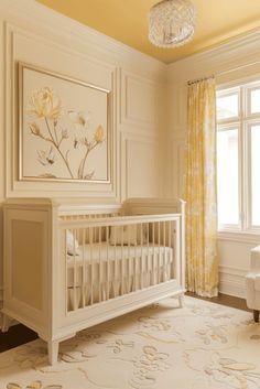 a baby's room with a white crib and yellow curtains