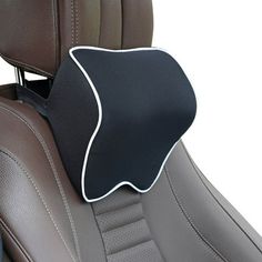 a car seat with a black and white pillow on it's headrests