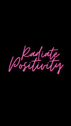 the words radiate positivity written in pink on a black background