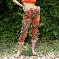 "1970s Pucci Pants | Velvet Capri | Orange and Brown | Waist 27 | Hips 38 | Vintage  Amazing orange and brown velvet psychedelic inspired print by Pucci, sold at Bergdorf Goodman. Made in Italy, 100% velvet cotton unlined capri pant from the 1970s. Belt loops, zips down front, buttons at waist.  Measurements: Waist: 27\" Hips: 38\" Inseam: 23\" Rise: 11\" Thigh: 11\" flat Teeny tiny spot on the pants, overall amazing condition. Some wear to button hole." Retro Brown Pants For Spring, Retro Brown Bottoms For Spring, Vintage Orange Pants For Spring, Leather Halter Top, Designer Bottoms, Nightgown Sets, Orange Pants, Blue Velvet Dress, Button Hole