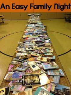 a long table with many books on it