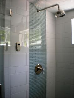 the shower is clean and ready for us to use in the bath room or bathroom