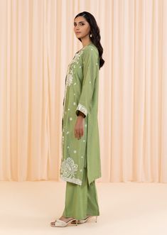 2 Piece - Embroidered Suit Make a bold statement with this 2-piece green dress, crafted from a combination of silk cotton net and viscose raw silk, with intricate embroidery for added texture and style. The full-sleeved jacket features a crew neckline, plain back, and embroidered border, while the trousers feature a boot cut design. Perfect for any occasion, this dress will be sure to turn heads. 2-Piece Front Open Jacket with TrousersMake a fashionable statement in green front open jacket featu Long Kurta With Intricate Embroidery For Spring, Long Sleeve Cotton Dress With Dabka Work, Embroidered Straight Kurta Sets For Spring, Transitional Cotton Dress With Resham Embroidery, Green Long Sleeve Lawn Suit With Zari Work, Spring Long Kurta With Resham Embroidery, Long Embroidered Sets For Spring, Green Lawn Suit For Summer Festivities, Festive Green Lawn Suit For Summer