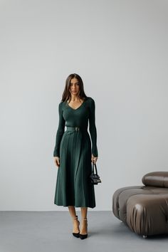 Belted comfy knitted winter dress in Emerald color. Green winter dress. Emerald green warm fall winter sweaterdress with pleated skirt. Material: 80% cotton 20% viscose Colors: Black, Emerald Green, Sage Green, Milky White, Beige Sizes:  XS-S- 115cm S-M-118cm M-L-121 cm L-XL-123 cm Model on the Photo: 173 cm-5.67 feet, S size PRODUCT CARE: - It is recommended to handwash 30oC. -twist carefully  -cotton knit fabric needs gentle care. FREE DELIVERY USA and CANADA. If you need our help in any question or concern, please reach out to us and we will help you out. Undine Muse Team.