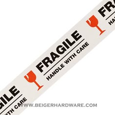 a white sticker with the words fragile, handle with care and wine glasses on it