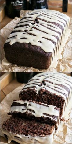 chocolate cake with white icing on top and one slice cut out from the side