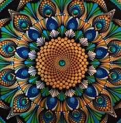 an artistic painting with lots of colors and patterns on it's surface, including the center