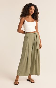 Take your casual look to the next level with the elevated, wide leg Isla Pucker Knit Pant. This pull on style features flattering details that will make this a pant you reach for on repeat. Relaxed High Waist Spring Pants, Relaxed High Waist Pants For Spring, Relaxed High Waist Wide Leg Pants For Spring, Casual High Waist Wide Leg Rayon Pants, Casual Rayon Bottoms For Fall, Relaxed High-waisted Wide Leg Pants For Spring, Relaxed Wide Leg Bottoms For Fall, Chic Wide Leg Pants For Vacation, Trendy Rayon Wide Leg Pants With Elastic Waistband