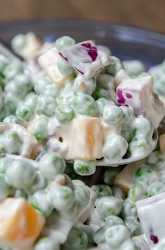 a bowl filled with white and green candy