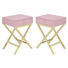 pair of pink side tables with gold metal legs and drawers on each end, one drawer open