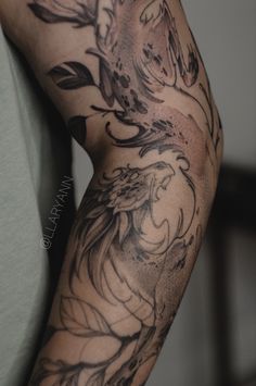 a person with a tattoo on their arm