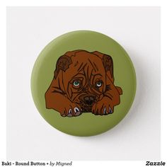 a button with a brown dog's face on it