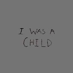 the words i was a child written in black ink on a gray background with an image of