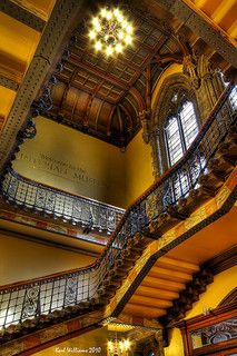 an ornate staircase in the middle of a building