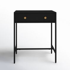 a small black table with two gold knobs on the top and one drawer open