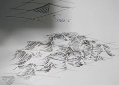 an image of a drawing on paper with lines and shapes in the bottom right corner