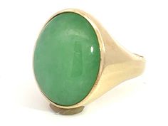 Item Specifications:Metal: 14k Yellow Gold Style: Statement RingRing Size: 11.75 (resizing available for a fee)Total Weight: 13.8 GramsGemstone Specifications:Center Gemstone: Jadeite JadeShape: OvalColor: GreenCut: CabochonJade Measurements: 21.04 mm x 16.8 mmCondition: Vintage, Excellent Green Oval Dome Ring For Formal Occasions, 14k Gold Ring With Large Stone, Classic Green Opal Ring In 14k Gold, Fine Jewelry Jade Ring For Formal Occasions, Formal Green 14k Gold Dome Ring, Formal Jade Rings Fine Jewelry, Formal Fine Jewelry Jade Rings, Oval Green Gemstones In 14k Gold, Green Dome Ring For Formal Occasions