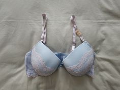 A NWT old stock Vintage Nylon and Lace Push Up Bra from Japan, in size 16D/Aus, 38D/UK and 38D/US, (Japanese F85) in a Light Blue chiffon and net finish on the cups with contrasting lace trim. Underwired and padded with elasticised, adjustable and removable straps and double clasp. Satin Bow between cups. Colour - Light Blue Bra Items, Cotton Bras, Comfortable Bras, Colour Light, Satin Bow, Bra Lingerie, Push Up Bra, Push Up, Bralette