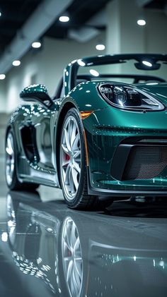 a green sports car parked in a garage