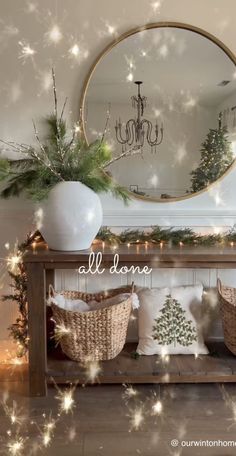 a table with christmas decorations on it and a mirror in the background that says, all done