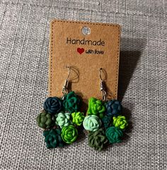 Super fun polymer clay succulent garden on your ears! Each pair is unique in the colors, shapes, and arrangement of the plants! Any preferences? Let me know in the personalization slot! Polymer Clay Succulent, Succulent Earrings, Succulent Garden, Succulents Garden, Favorite Jewelry, Succulent, Jewelry Earrings Dangle, Etsy Earrings, Polymer Clay