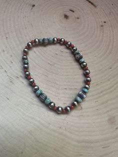 New without tag* METAL : Sterling Silver * BRAND : Nizhoni Traders LLC * JEWELRY TYPE : Bracelets  * TYPE : Beads  * STYLE : Beaded     Beautiful Handmade Turquoise, Coral Sterling Silver Beaded Stretch Bracelet. Measures 7 inches around. Perfect for any collection. Such a beautiful bracelet!      Stones are natural and may vary.       Non native      Thank you for looking at our items. Please contact us if you have any questions.  5/21/24    Exported By ExportYourStore :) SKU:449771464951_5E70* Bracelet Stones, Coral Turquoise, Beaded Stretch Bracelet, Sterling Silver Bead, Stretch Bracelet, Stretch Bracelets, Sterling Silber, Beautiful Bracelet, Silver Beads