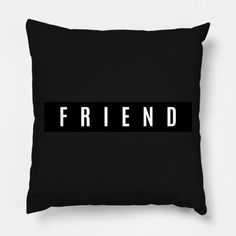 a black pillow with the word friend printed on it