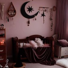 a baby's room with pink walls and decorations