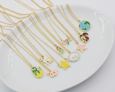 "Kids necklace-children-baby dinosaur-flamingo-unicorn-star-mermaid-cloud-dragonfly-starfish-squirrel-earth-unisex-gift for little girl - Material: 18K gold plated - NecklaceLength: 13\"+2\" adjustable extension as shown in the pictures. - Comes in a cute little gift box *View other smiley face jewelry here: https://www.etsy.com/shop/DearMia?ref=seller-platform-mcnav&search_query=smiley+face *view our store front here:https://www.etsy.com/shop/DearMia" Smiley Face Jewelry, Squirrel Necklace, Face Jewelry, Girl Material, Baby Dinosaur, Face Jewellery, Baby Dinosaurs, Unisex Gift, Kids Necklace