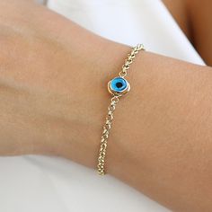 This stunning 14k Gold 10mm Evil Eye Amulet Nazar Bracelet is a powerful symbol of protection and good fortune. Handcrafted with care, the Nazar bracelet is designed to ward off negative energy and bring good luck. Made from 14k solid gold, the evil eye bracelet features a striking 10mm evil eye amulet for both style and spiritual significance. It makes an ideal gift for her on any occasion--whether you're looking for a Christmas gift, Mothers gift, or even a unique bridesmaid gift. This piece o Nazar Bracelet, Nazar Amulet, Evil Eye Amulet, Meaningful Christmas Gifts, Amulet Bracelet, Bridesmaid Gifts Unique, Unique Bridesmaid, Gold Armband, Luck Charm