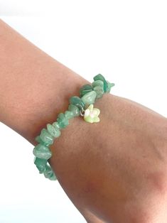 Elevate your style with our stunning Aventurine Succulent Bracelet. Crafted with a natural aventurine crystal and adorned with a charming succulent charm, this bracelet is a unique and eye-catching accessory that will add a touch of nature-inspired beauty to any outfit. Get ready to turn heads and embrace the healing properties of aventurine with this must-have bracelet. Order yours today and experience the magic! Green Aventurine Gemstone Beaded Bracelets, Casual Aventurine Jewelry For Gifts, Casual Green Agate Bracelets, Casual Green Agate Bracelet, Green Aventurine Crystal Bracelet With Natural Stones, Adjustable Green Aventurine Crystal Bracelet, Adjustable Aventurine Beaded Bracelets, Casual Adjustable Aventurine Beaded Bracelets, Casual Adjustable Aventurine Bracelets