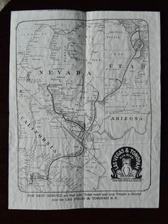 an open book with a map on the front and back cover, in black and white