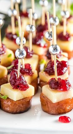 small appetizers with cranberry sauce and toothpicks