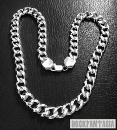 HEAVY AND WIDE CURB CUBAN MENS NECKLACE STERLING SILVER Material : Solid 925 Sterling Silver Weight 165 gr. (5.85 oz) (for 24 inches-61 cm) Width: 13 mm, Thickness: 5 mm We ship to worldwide by registered air mail, it usually takes 20-25 days to arrive, but sometimes it may takes about or more than 30 days(it may affected by post office, custom or weather, ect). Classic Silver Chunky Jewelry, Silver Chunky Classic Jewelry, Classic Chunky Silver Jewelry, Mens Chain, Mens Sterling Silver Necklace, Mens Necklace, Silver Chain Style, Men's Necklace, Silver Material